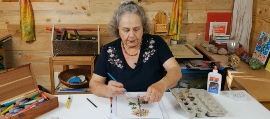 woman making seed mosaic