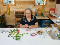 woman making femo pendant