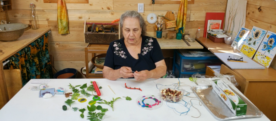 woman making femo pendant