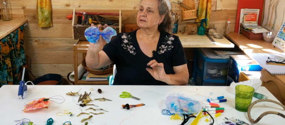 woman making pollinators mobiles